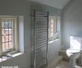 Ashdown 520 flat-front stainless steel heated towel rail