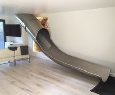 Bespoke interior slide adds fun and style to family home