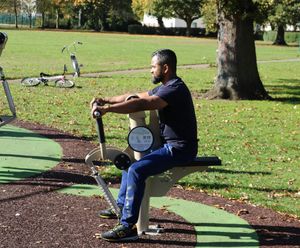 Outdoor fitness gym with phone app for city park