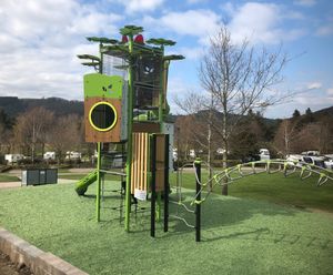 Natural themed playground and tower unit for Lakes park