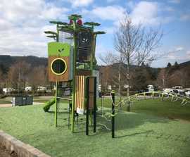 Natural themed playground and tower unit for Lakes park