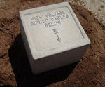 Precast concrete cable marker blocks