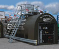 Above-ground enclosed bunded storage tanks
