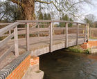 Solid timber beam footbridges