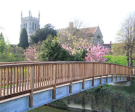 Steel and timber composite bridges