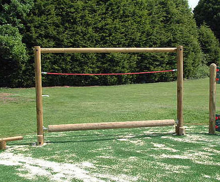 Revolving log trim trail play equipment