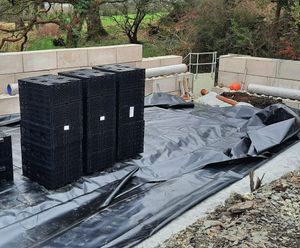 Attenuation tank installation for housing development